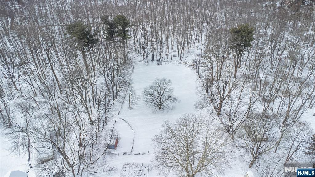 573 Wyckoff Avenue Mahwah, NJ 07430 - Photo 27 of 30 a view of white house next to a road