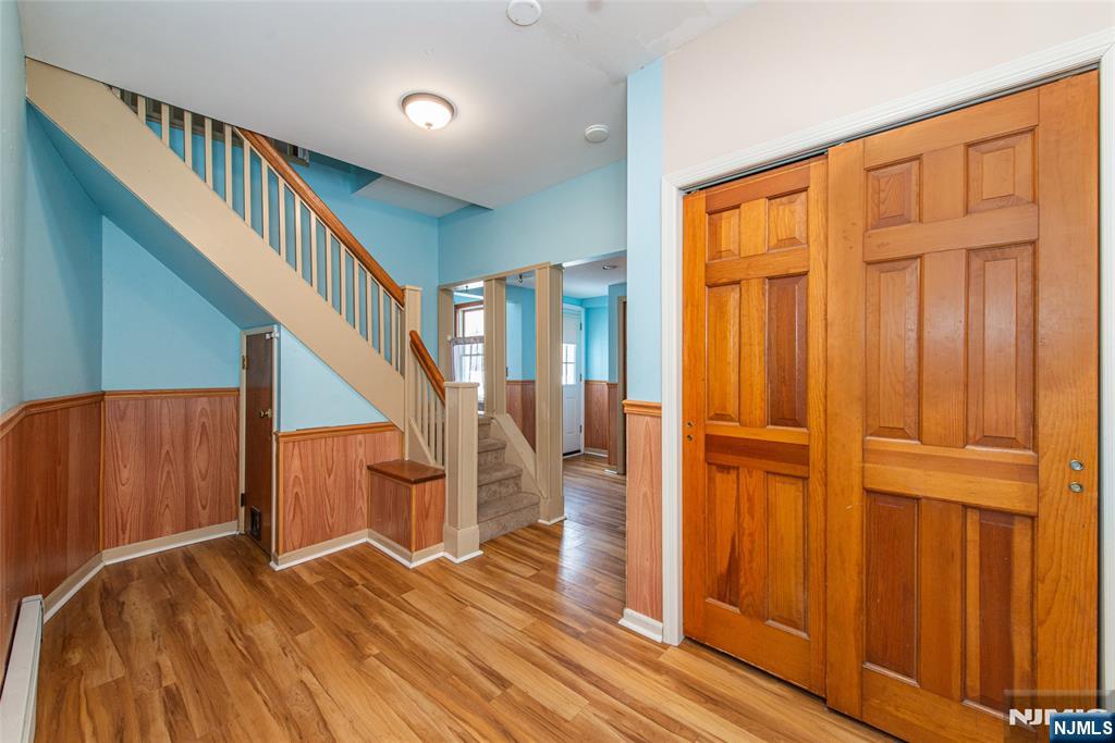 573 Wyckoff Avenue Mahwah, NJ 07430 - Photo 4 of 30 a view of entryway with wooden floor and staircase