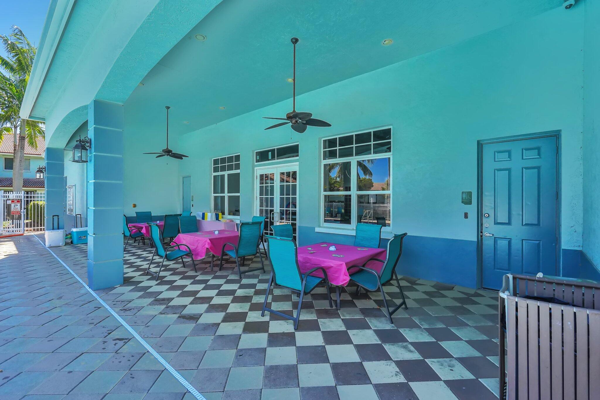 1969 Alamanda Way, Unit 1969 Riviera Beach, FL 33404 - Photo 21 of 26 a view of a room with wooden floor and windows