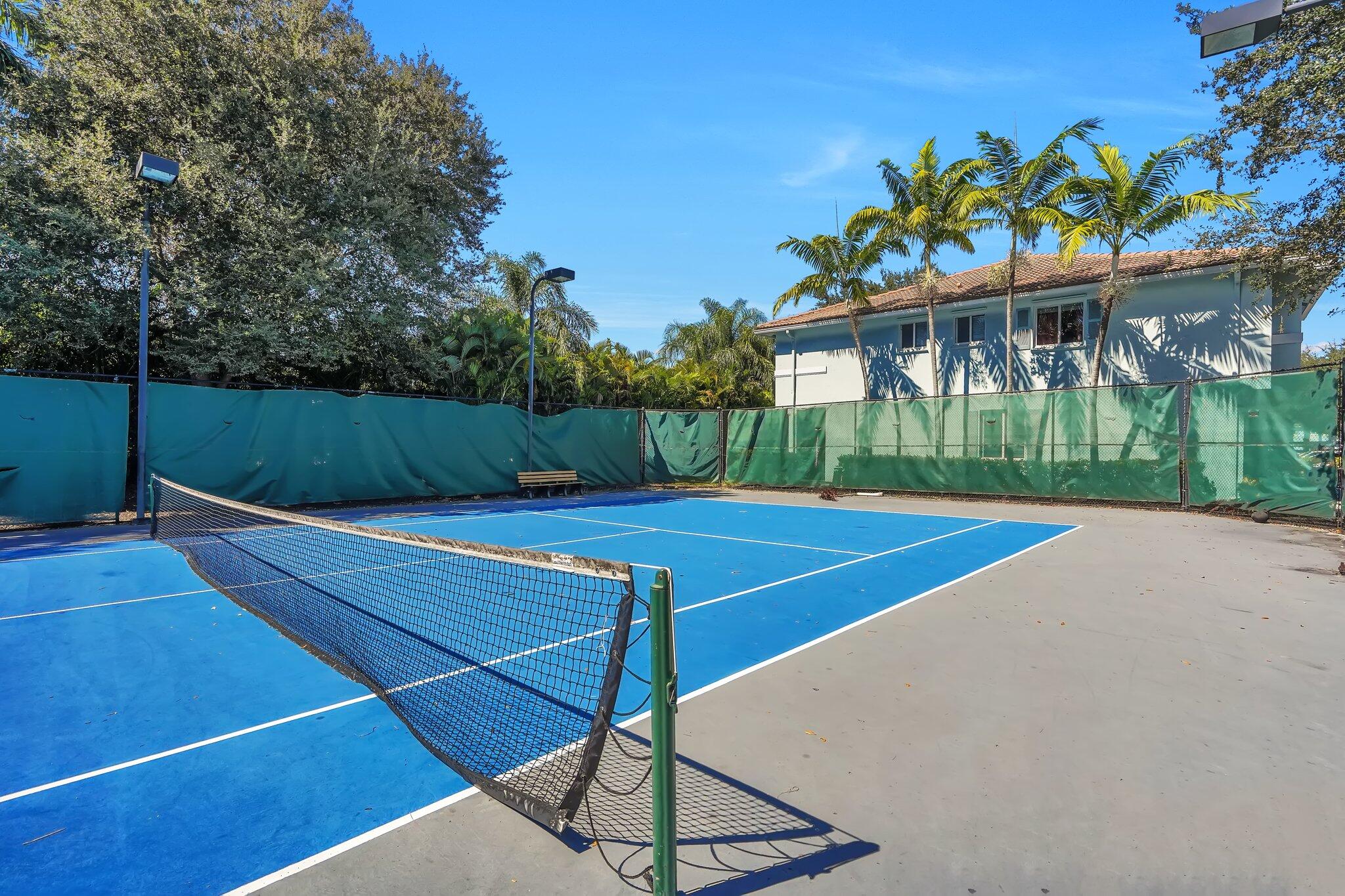 1969 Alamanda Way, Unit 1969 Riviera Beach, FL 33404 - Photo 22 of 26 a view of a tennis court
