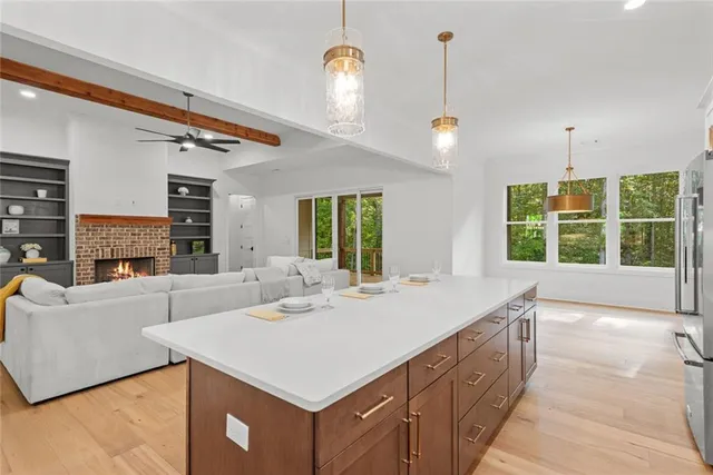 a bedroom with a bed and a fireplace