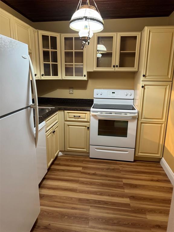 3774 Inverrary Boulevard, Unit 106P Lauderhill, FL 33319 - Photo 11 of 29 a kitchen with stainless steel appliances a stove a microwave and a sink