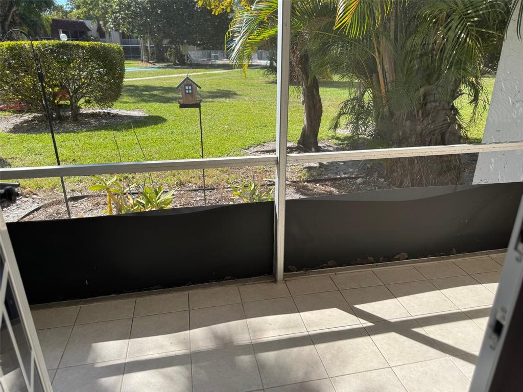 3774 Inverrary Boulevard, Unit 106P Lauderhill, FL 33319 - Photo 22 of 29 a view of a balcony with an outdoor space