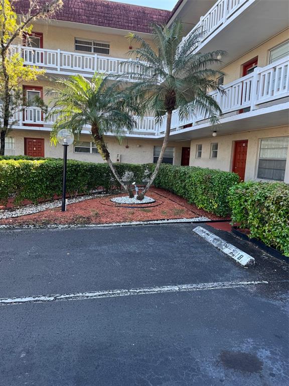 3774 Inverrary Boulevard, Unit 106P Lauderhill, FL 33319 - Photo 26 of 29 a front view of a building