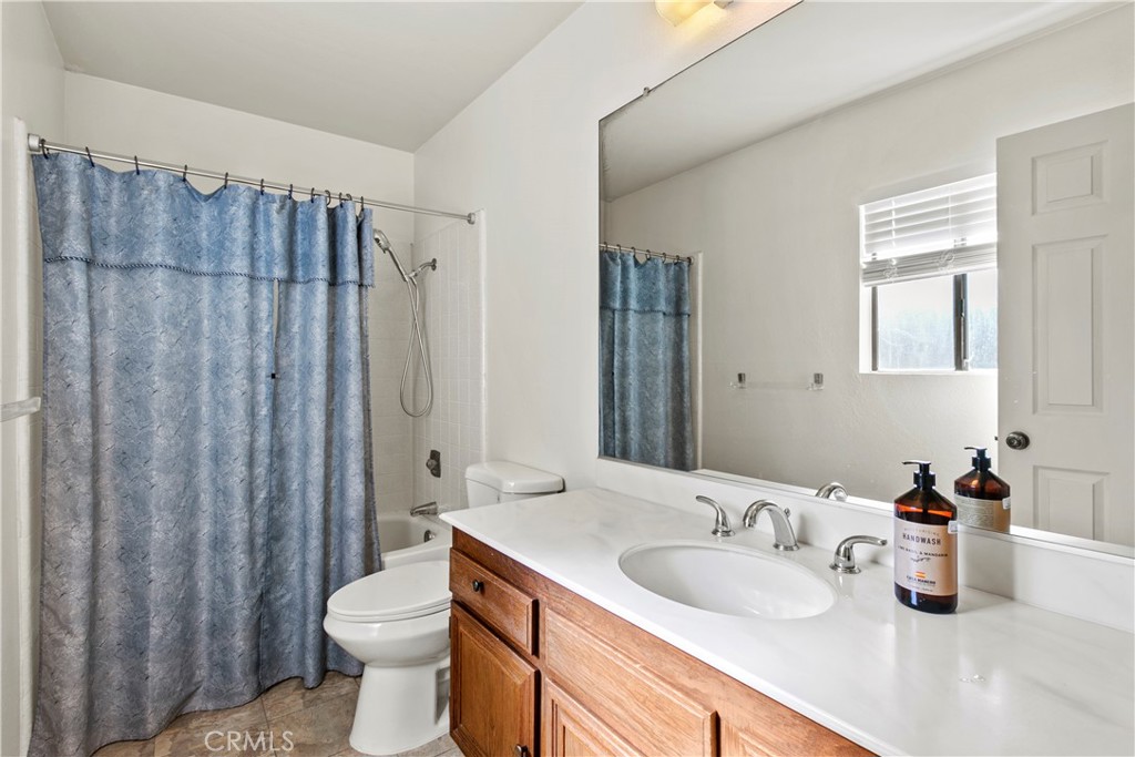 51 Rainbow Irvine, CA 92603 - Photo 12 of 25 a bathroom with a sink toilet and shower