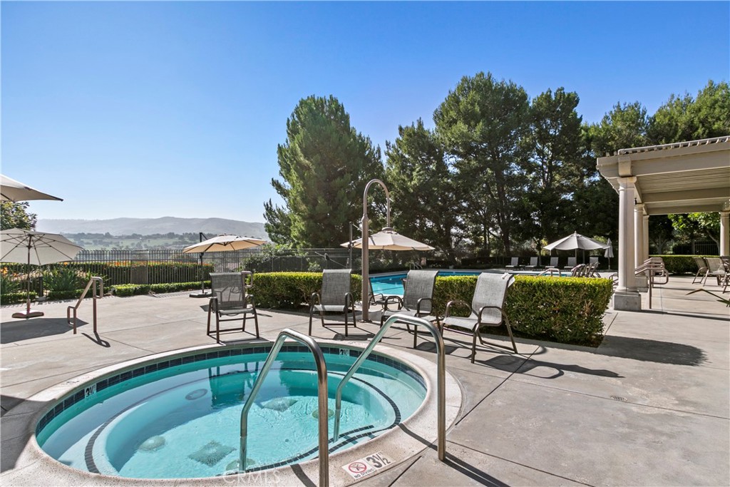 51 Rainbow Irvine, CA 92603 - Photo 20 of 25 a swimming pool with outdoor seating and yard