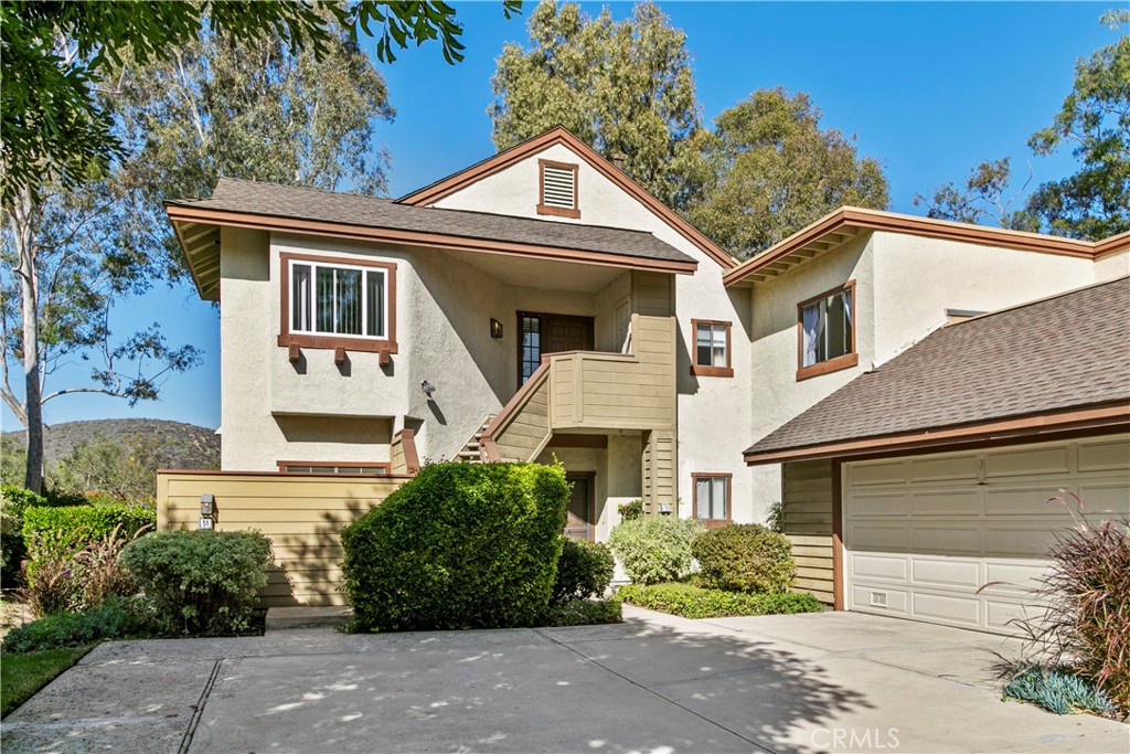 51 Rainbow Irvine, CA 92603 - Photo 3 of 25 a front view of a house with garden