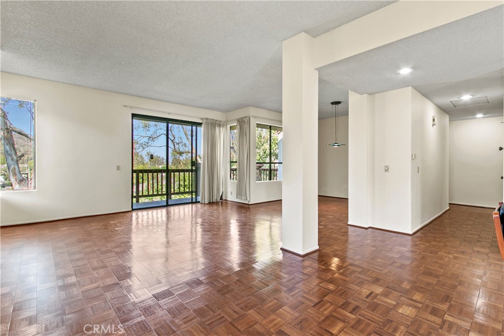 51 Rainbow Irvine, CA 92603 - Photo 5 of 25 wooden floor in an empty room with a window
