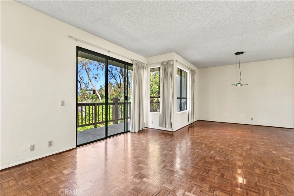 51 Rainbow Irvine, CA 92603 - Photo 6 of 25 a view of an empty room with a window