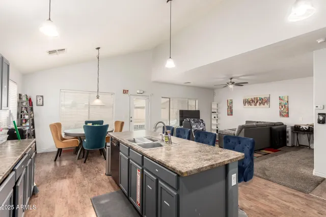 a bathroom with a sink toilet and a mirror