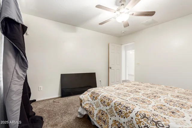 a close view of a sink and cabinets