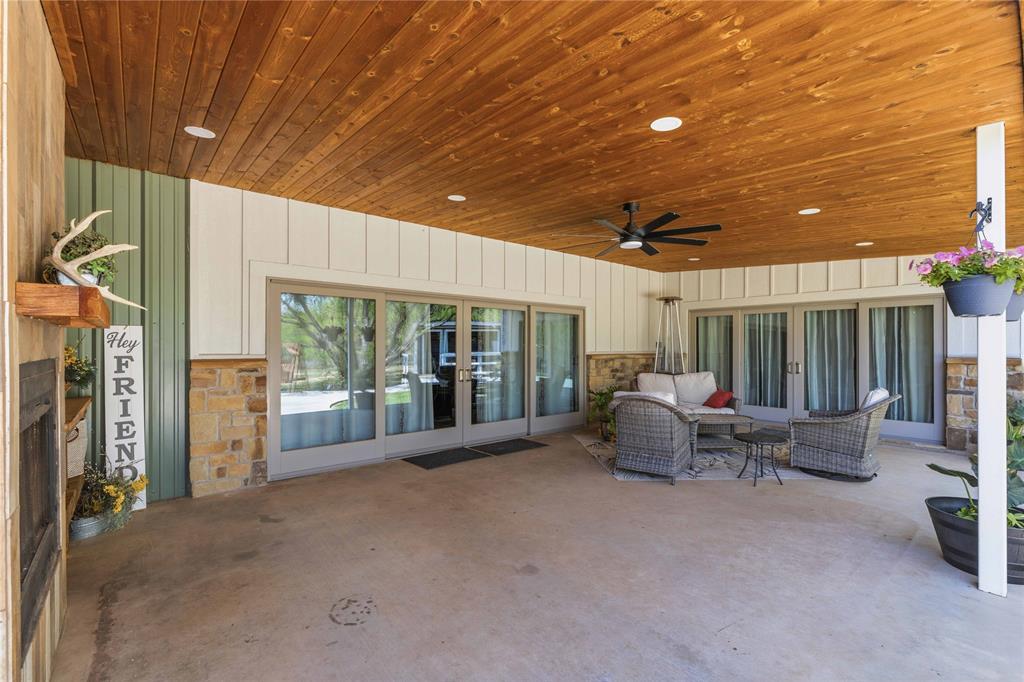 1601 County Road 156 Bangs, TX 76823 - Photo 27 of 40 a building outdoor space with patio furniture and potted plants