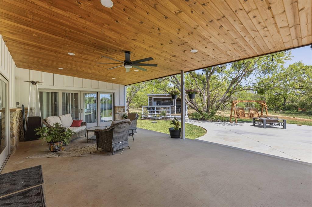1601 County Road 156 Bangs, TX 76823 - Photo 28 of 40 a view of a patio with swimming pool table and chairs