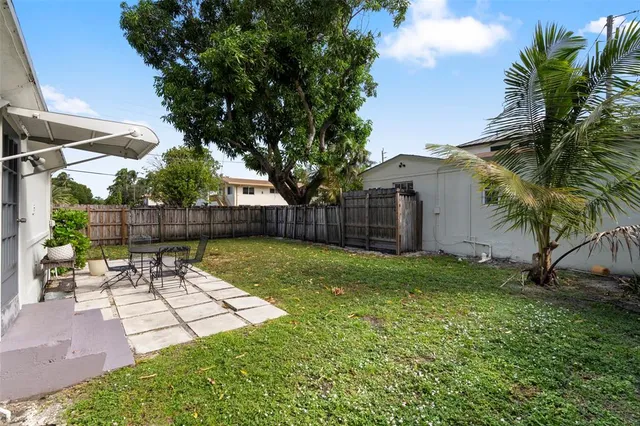 a view of a backyard with a garden