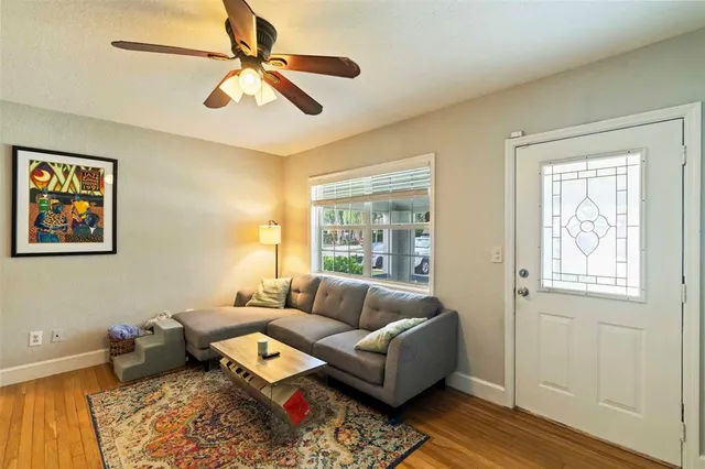 a living room with furniture and a window