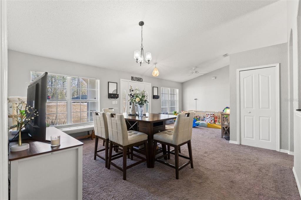 15335 Fleetwood Road Weeki Wachee, FL 34614 - Photo 7 of 40 a view of a dining room with furniture window and outside view
