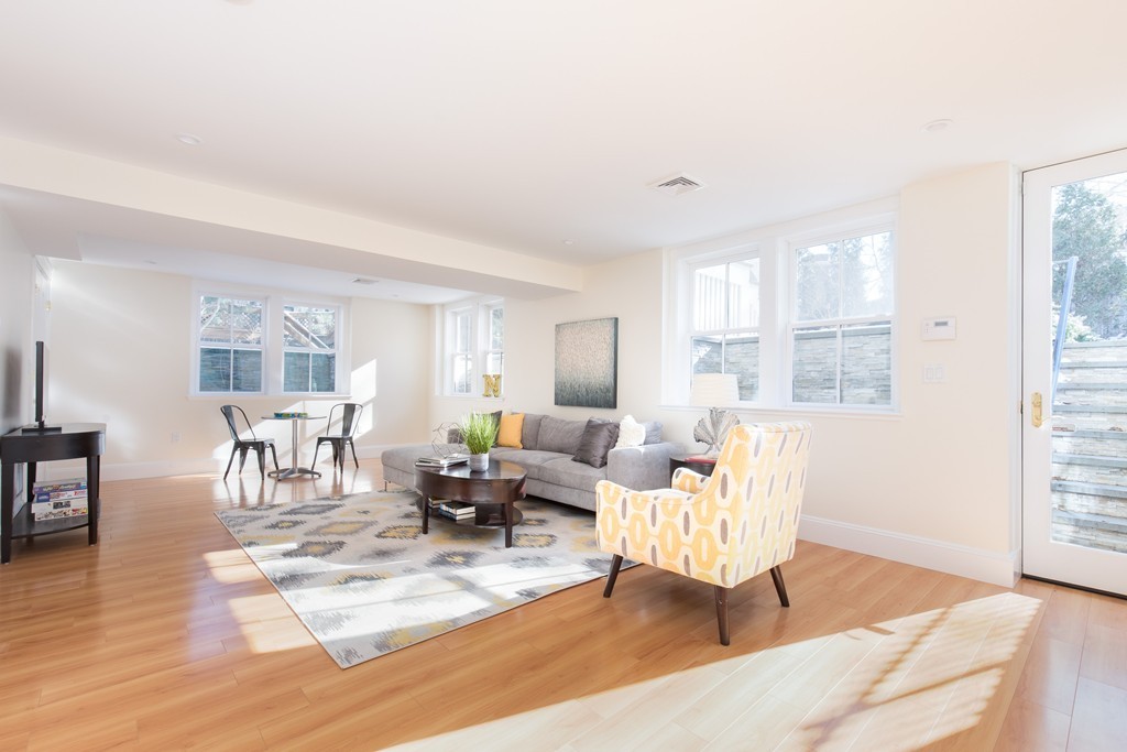 26 Parker Street Cambridge, MA 02138 - Photo 23 of 29 a living room with furniture and a table