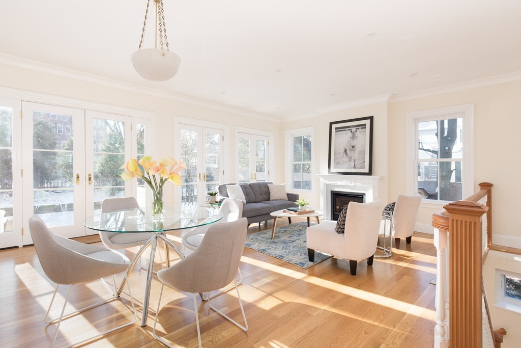 26 Parker Street Cambridge, MA 02138 - Photo 3 of 29 a living room with fireplace furniture and a large window