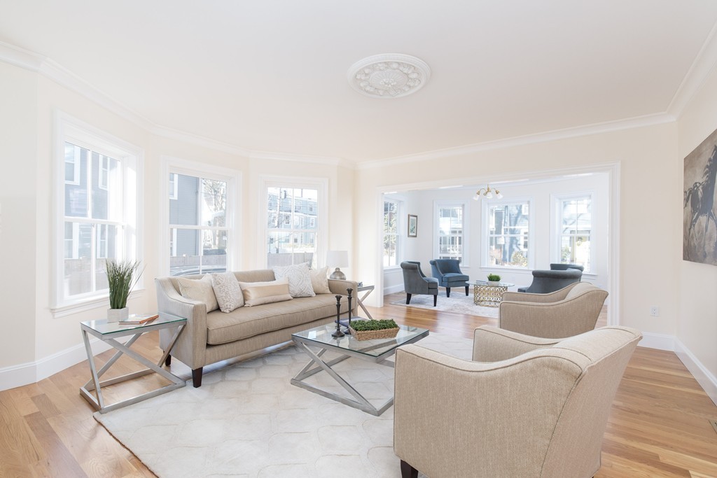 26 Parker Street Cambridge, MA 02138 - Photo 9 of 29 a living room with furniture and a large window