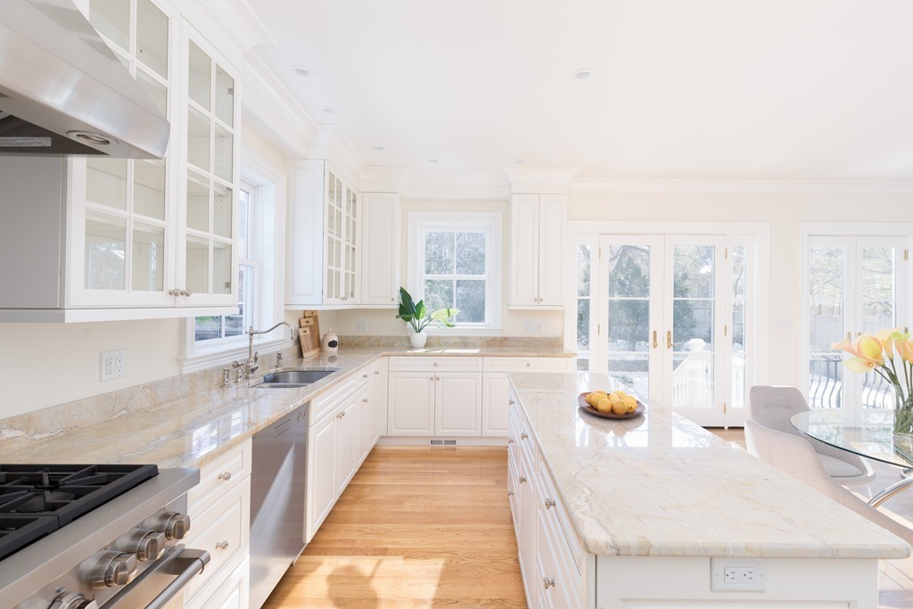 26 Parker Street Cambridge, MA 02138 - Photo 10 of 29 a large white kitchen with a large window