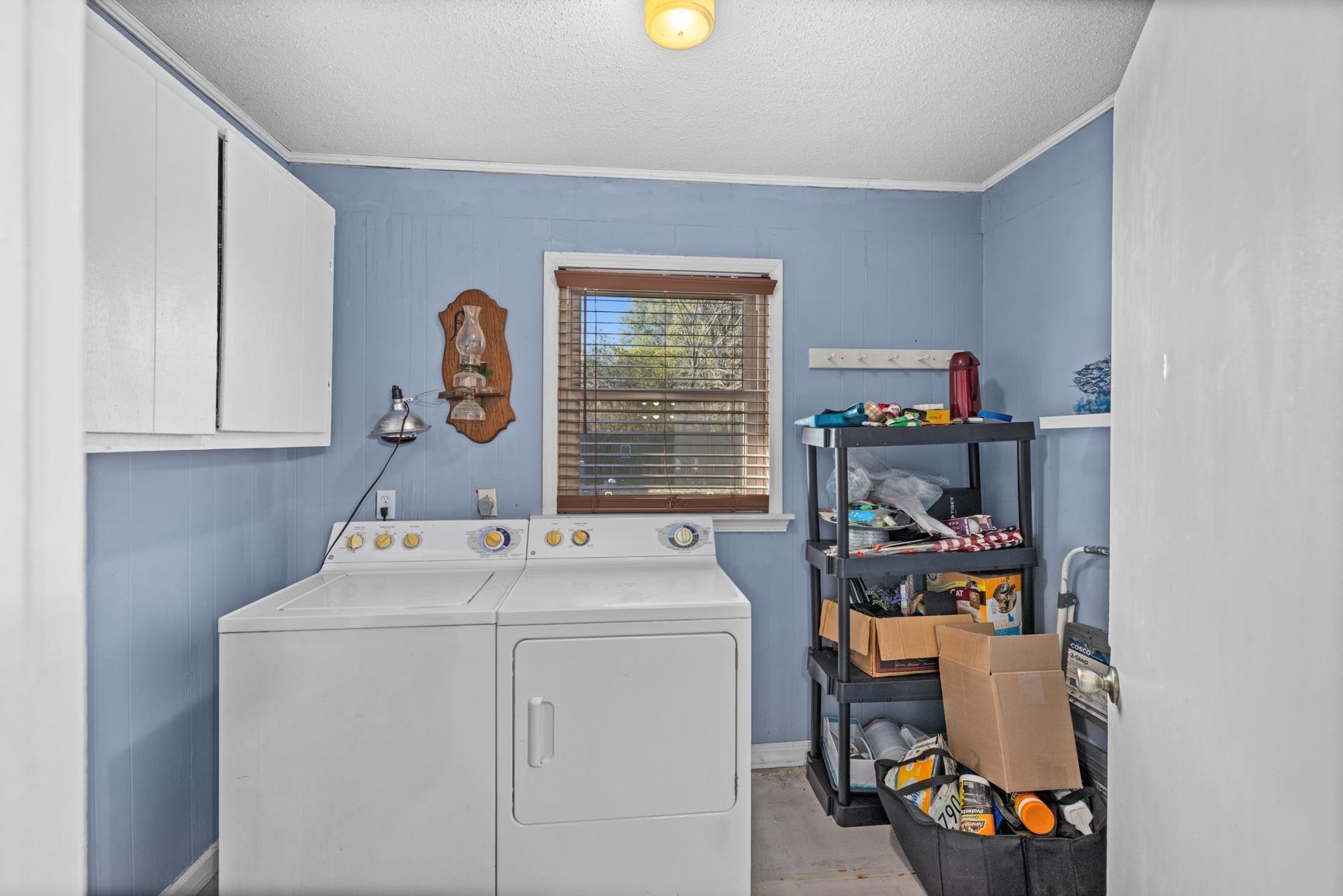 163 Michelle Street Burlison, TN 38015 - Photo 6 of 13 a room with storage and utility