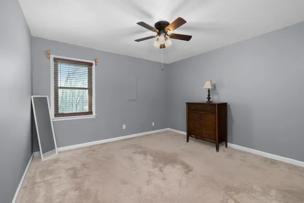 a view of room with workspace and window