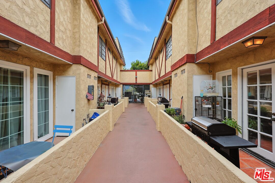 7422 Hazeltine Avenue, Unit 3 Van Nuys, CA 91405 - Photo 31 of 36 a view of a building with a balcony