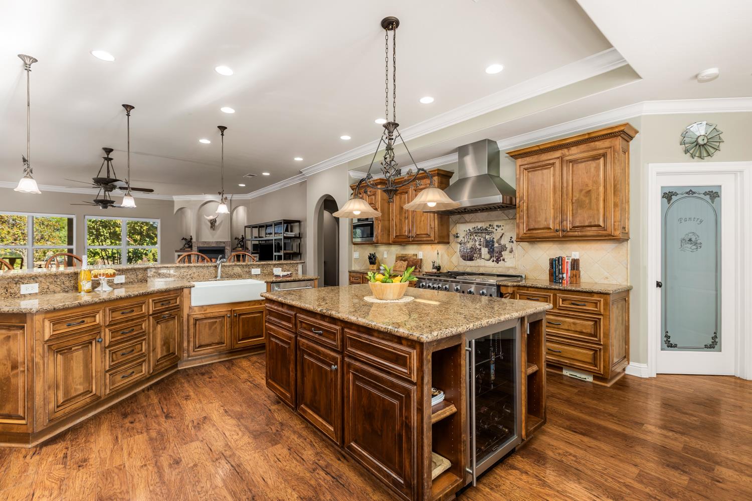 20945 Bear Hollow Road Grass Valley, CA 95949 - Photo 42 of 82 a kitchen with stainless steel appliances granite countertop a stove and cabinets