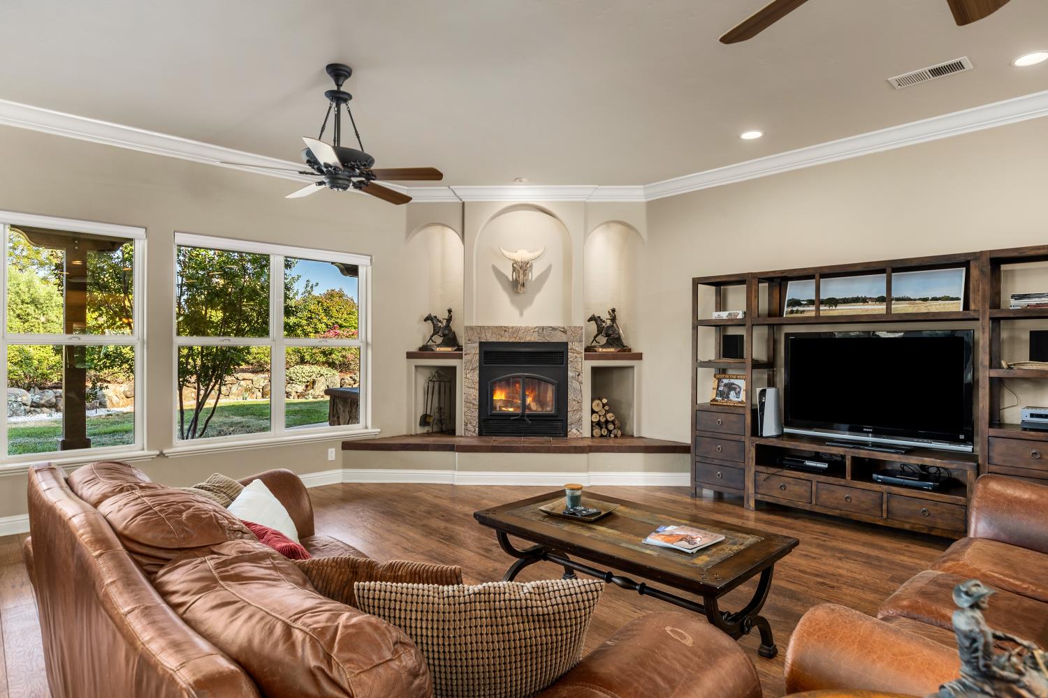 20945 Bear Hollow Road Grass Valley, CA 95949 - Photo 44 of 82 a living room with furniture a window and a flat screen tv