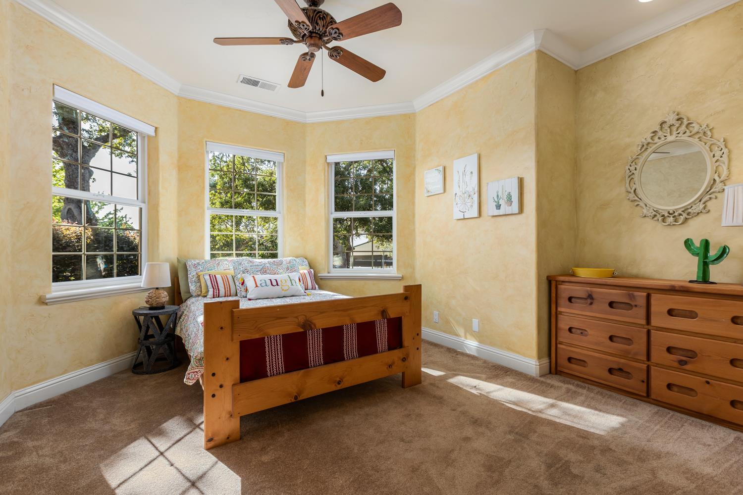 20945 Bear Hollow Road Grass Valley, CA 95949 - Photo 56 of 82 a bed sitting in a bedroom next to a window