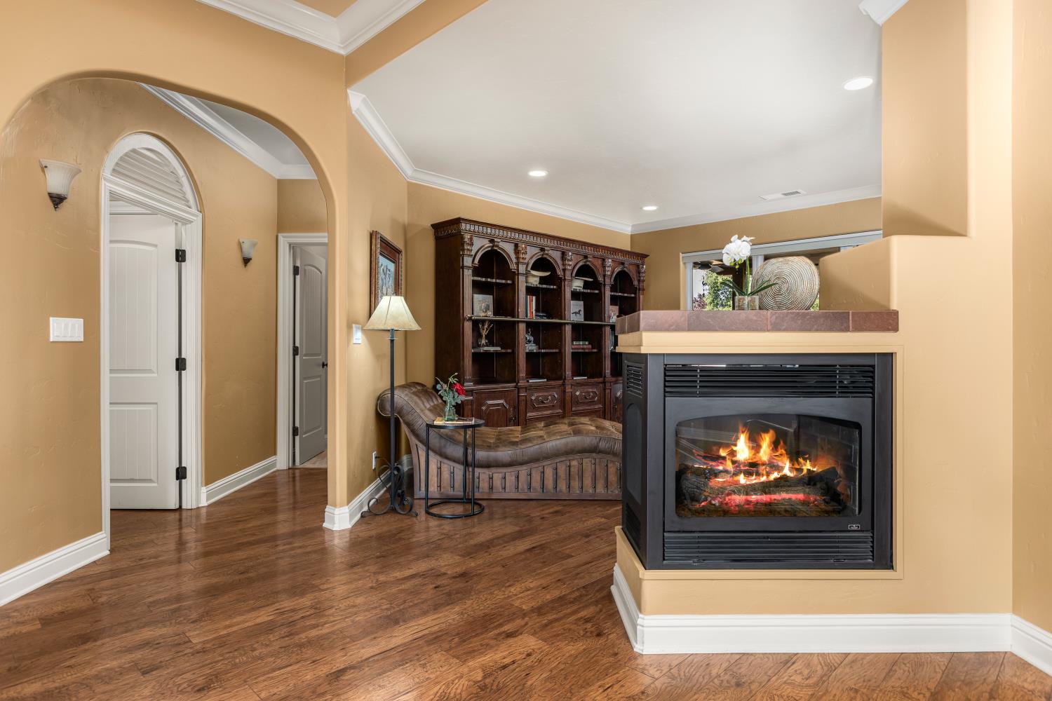 20945 Bear Hollow Road Grass Valley, CA 95949 - Photo 58 of 82 a living room with furniture and a fireplace