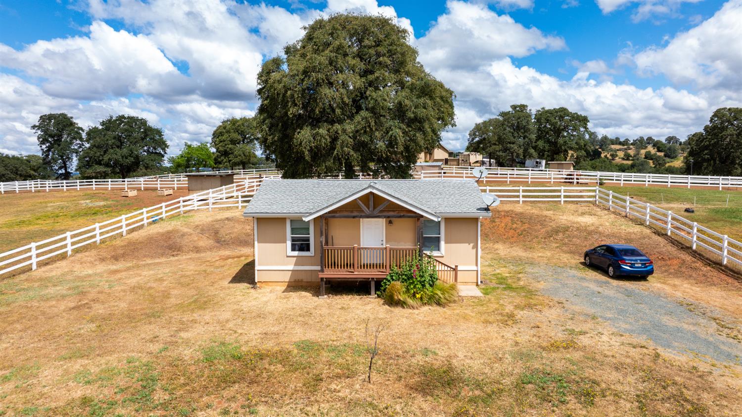 20945 Bear Hollow Road Grass Valley, CA 95949 - Photo 78 of 82 a view of a swimming pool with a patio and a yard