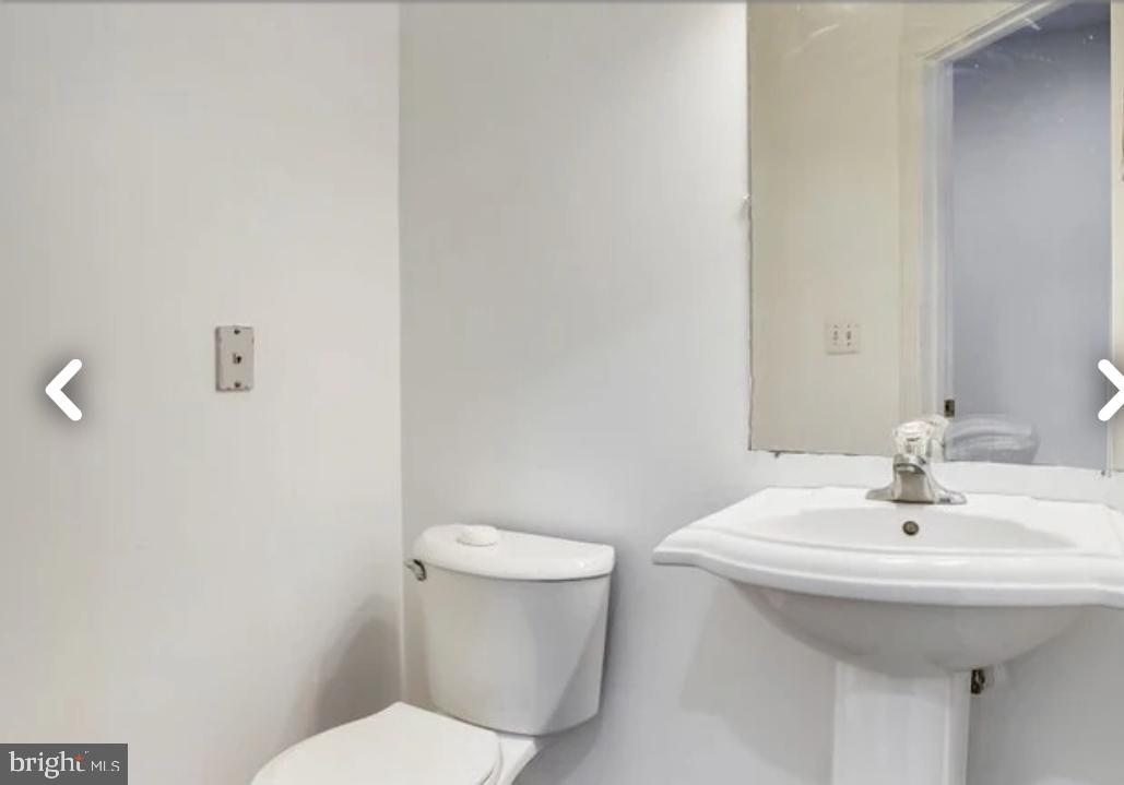 111 East Cross Street Baltimore, MD 21230 - Photo 11 of 36 a bathroom with a sink and a toilet