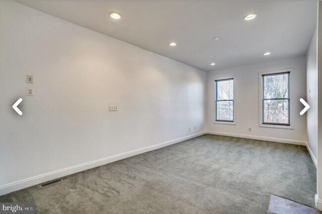 111 East Cross Street Baltimore, MD 21230 - Photo 14 of 36 an empty room with windows