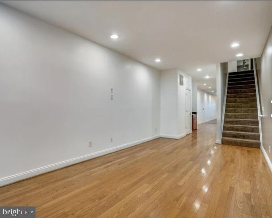111 East Cross Street Baltimore, MD 21230 - Photo 5 of 36 a view of room and stairs