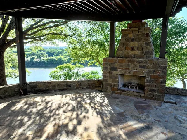 a view of a wooden deck with a bench