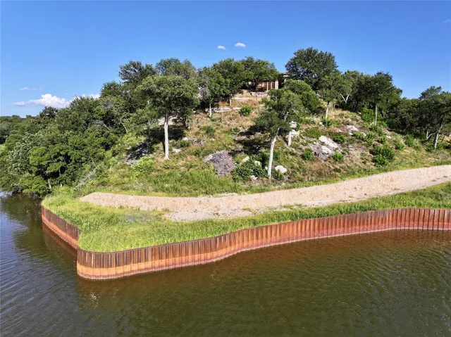 a view of a fence in a yard