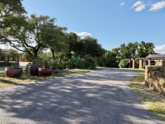a backyard of a house with lots of green space