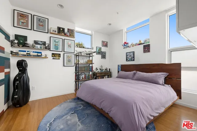 a bed room with a bed and a walk in closet