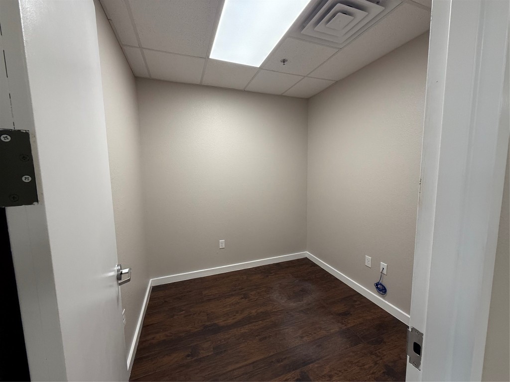 1101 Bunton Creek Road Kyle, TX 78640 - Photo 4 of 17 a view of a room with wooden floor