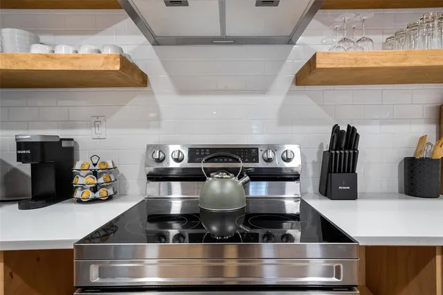 a close view of water heater and cabinet