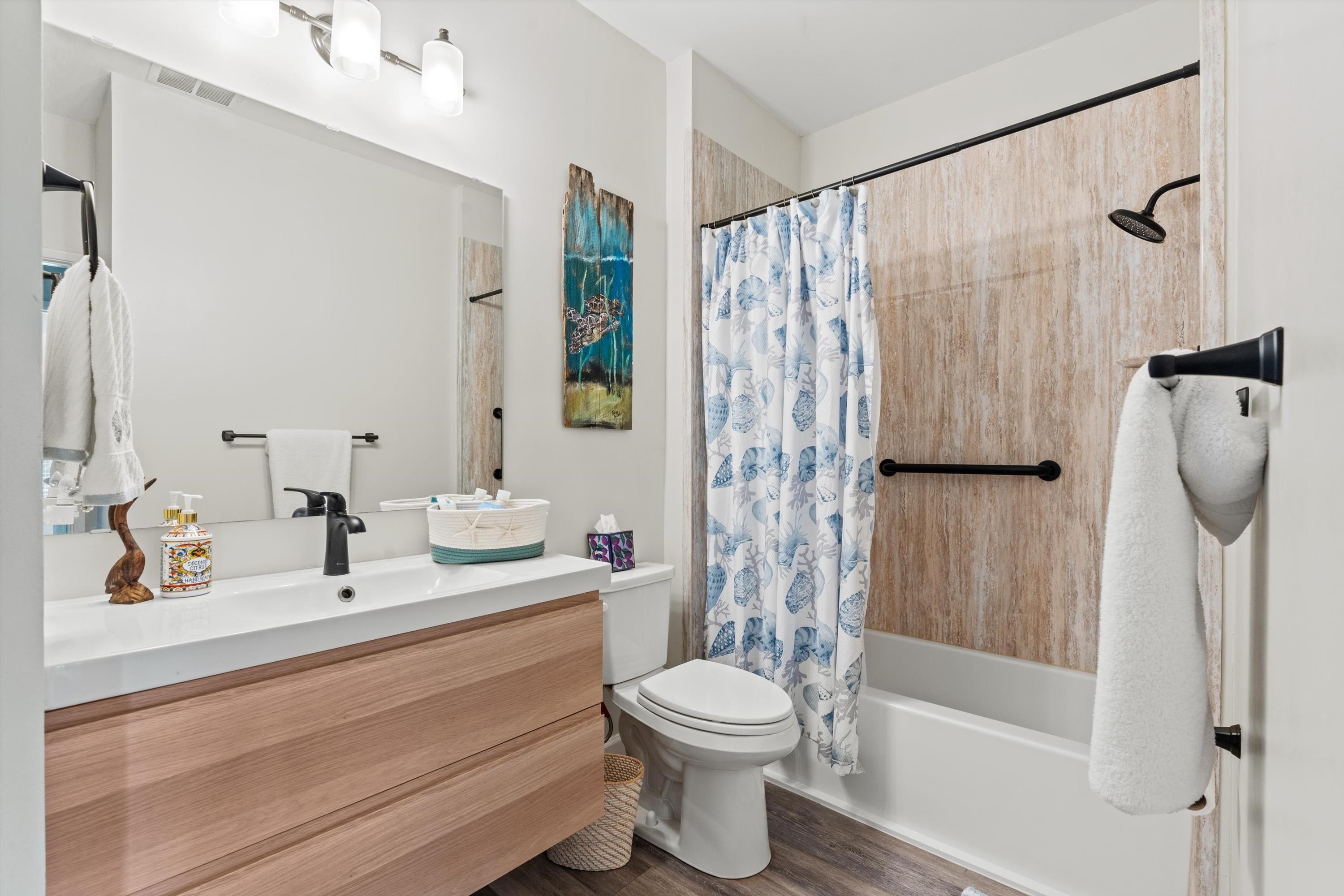 540 Florida Club Boulevard, Unit 210 St. Augustine, FL 32084 - Photo 17 of 33 Full bathroom featuring shower / bath combo, vanity, and dark wood finished floors