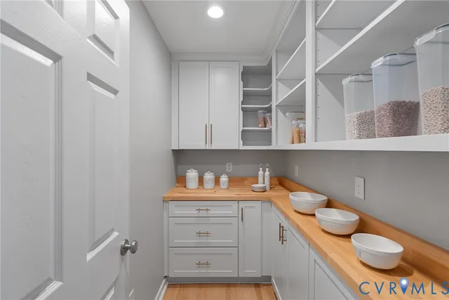 a view of cabinets and window