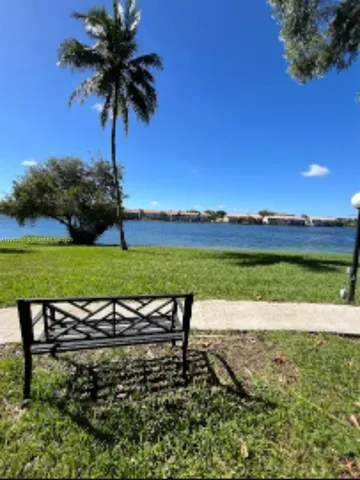a view of a lake with a big yard