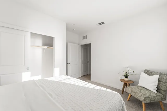 a kitchen with stainless steel appliances a sink stove and refrigerator