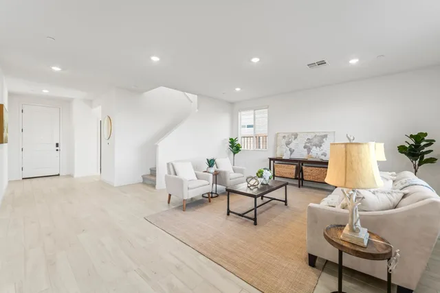 a kitchen with a sink and a large window