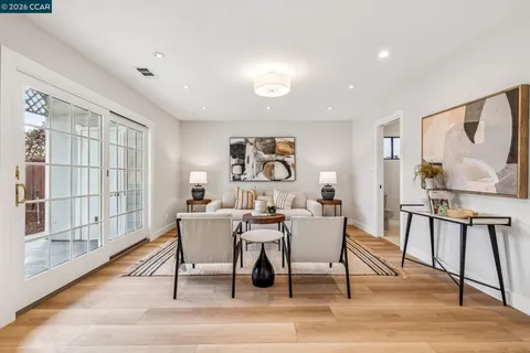 a workspace with furniture and window