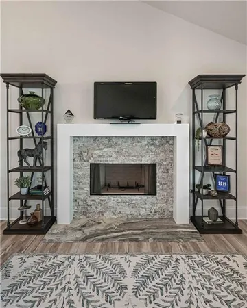 a kitchen with a table and chairs in it