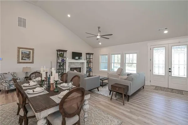 a kitchen with a table and chairs in it