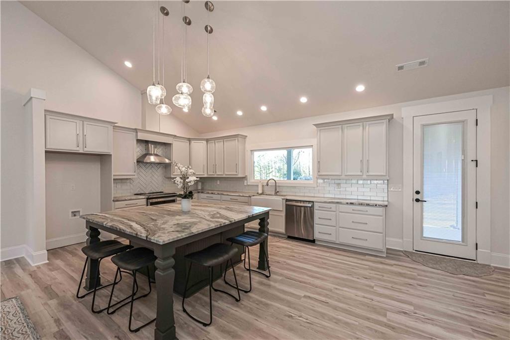 3667 Jones Mill Road Carrollton, GA 30116 - Photo 18 of 66 a kitchen with a table and chairs in it